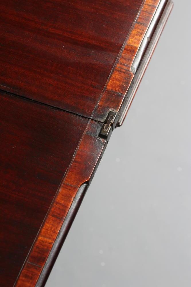 A GEORGIAN MAHOGANY FOLDING TEA TABLE Image