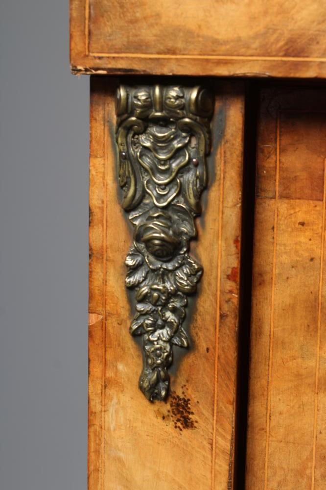 A VICTORIAN WALNUT AND MARQUETRY PIER CABINET with gilt metal mounts and ebony trim Image
