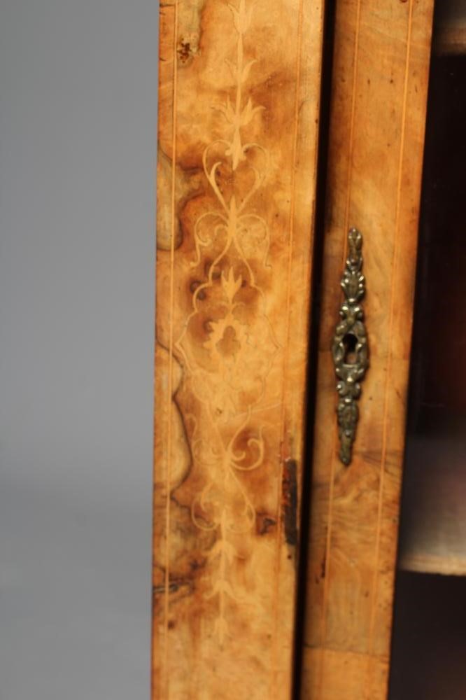 A VICTORIAN WALNUT AND MARQUETRY PIER CABINET with gilt metal mounts and ebony trim Image