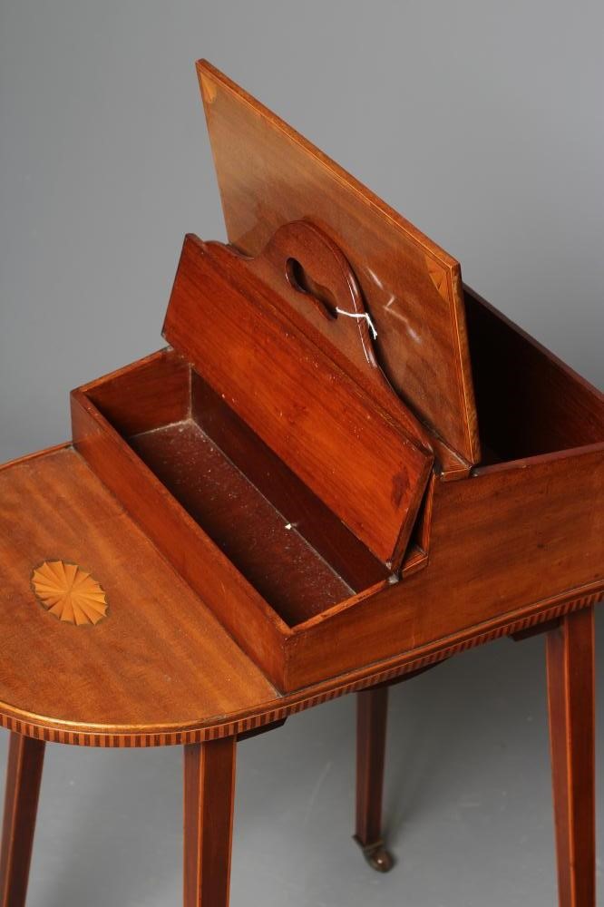 AN EDWARDIAN MAHOGANY AND BANDED BUTLERS TABLE of oblong form with marquetry paterae and bowed tray Image