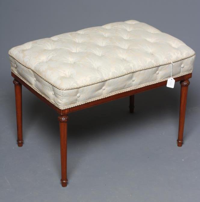 AN EDWARDIAN MAHOGANY DRESSING STOOL of oblong form with ebony stringing Image