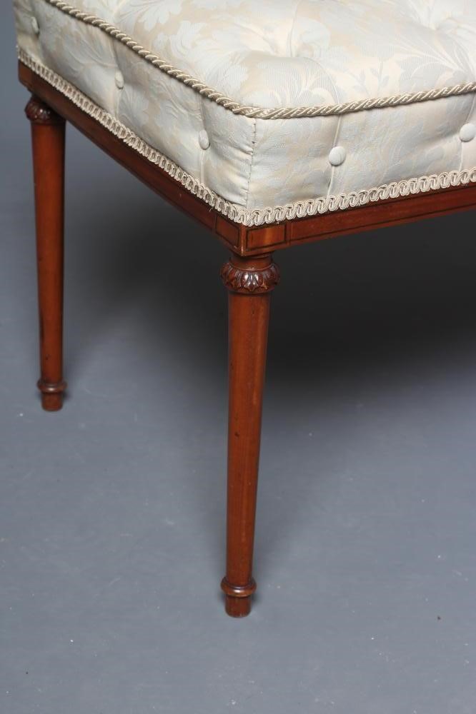 AN EDWARDIAN MAHOGANY DRESSING STOOL of oblong form with ebony stringing Image
