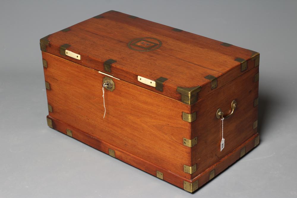 A SMALL MAHOGANY BRASS BOUND TRUNK Image
