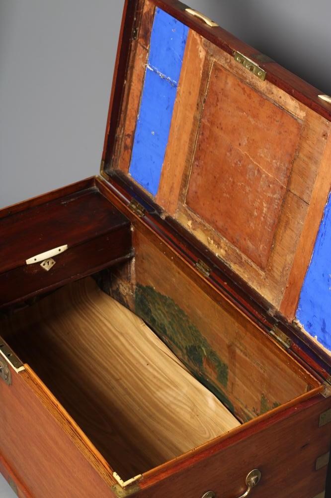 A SMALL MAHOGANY BRASS BOUND TRUNK Image