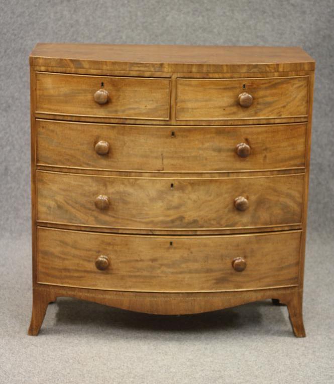A REGENCY MAHOGANY BOWED CHEST Image