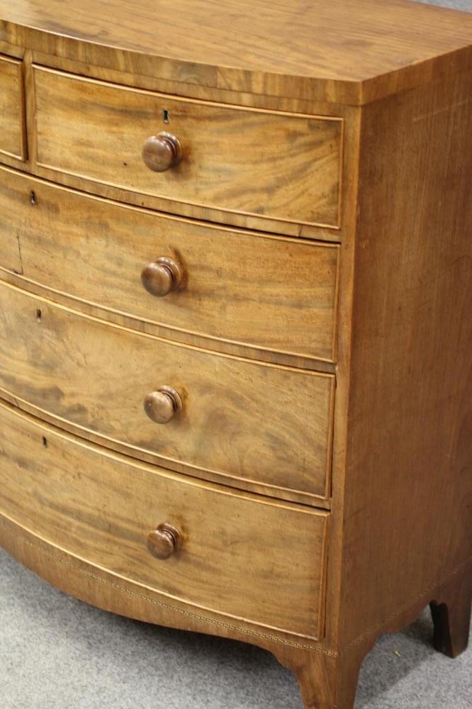 A REGENCY MAHOGANY BOWED CHEST Image