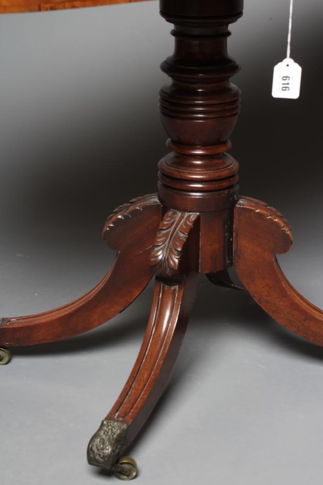A GEORGE IV MAHOGANY FOLDING TEA TABLE of rounded oblong form with reeded edged top Image