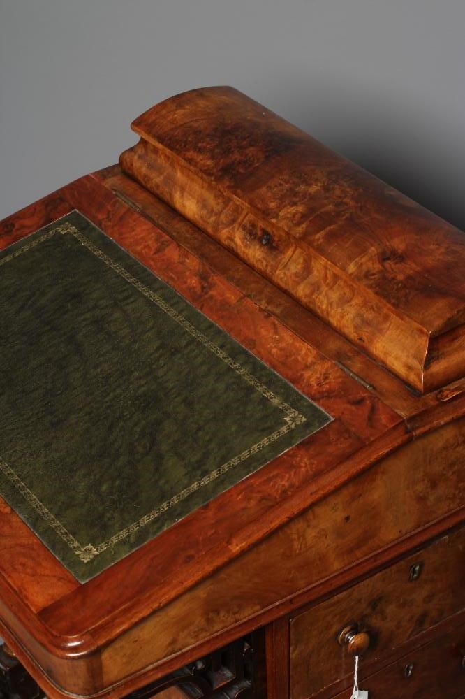 A VICTORIAN WALNUT DAVENPORT Image