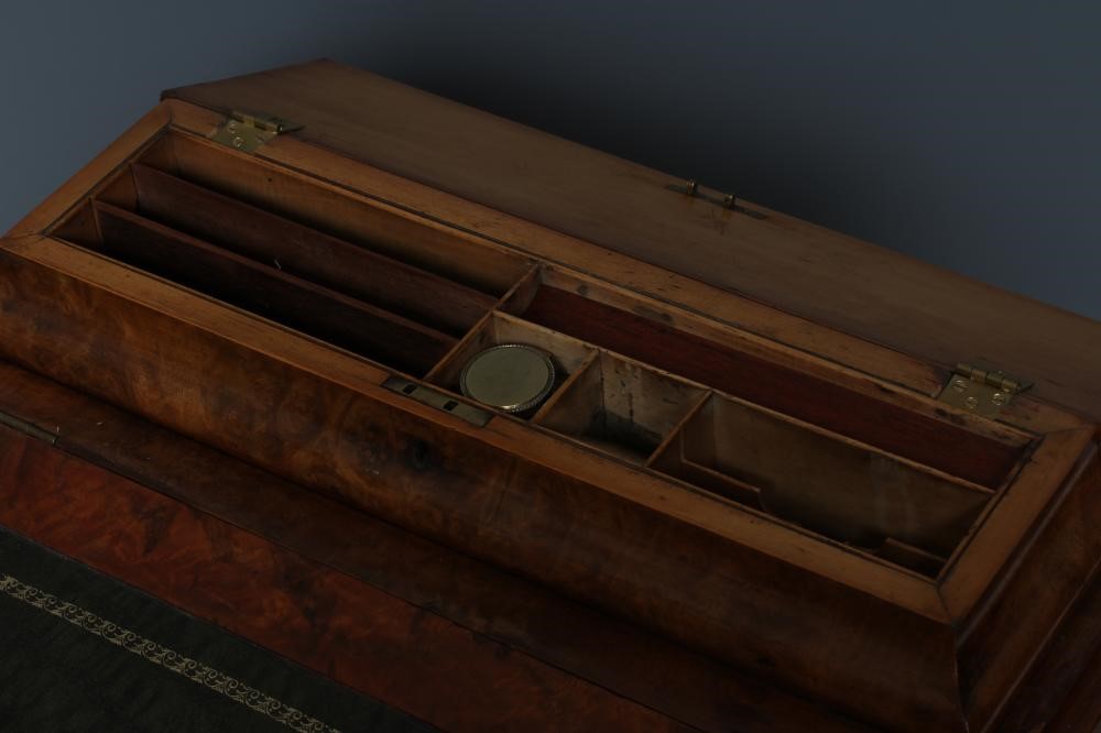 A VICTORIAN WALNUT DAVENPORT Image