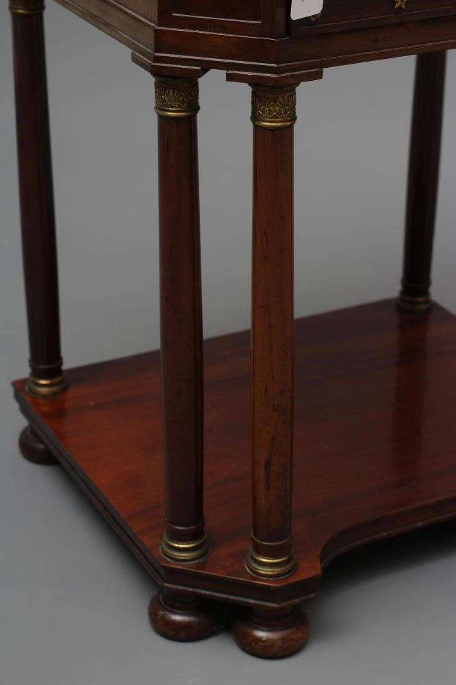 A FRENCH EMPIRE STYLE MAHOGANY BEDSIDE COMMODE of canted oblong form with gilt metal mounts Image