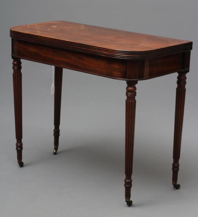 A GEORGIAN MAHOGANY FOLDING TEA TABLE Image