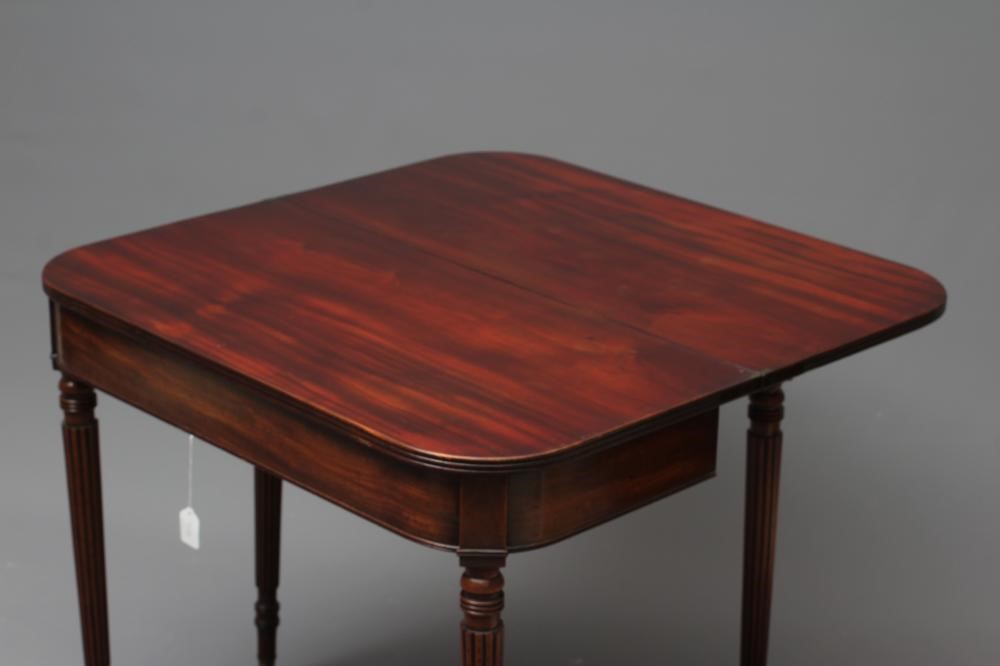 A GEORGIAN MAHOGANY FOLDING TEA TABLE Image