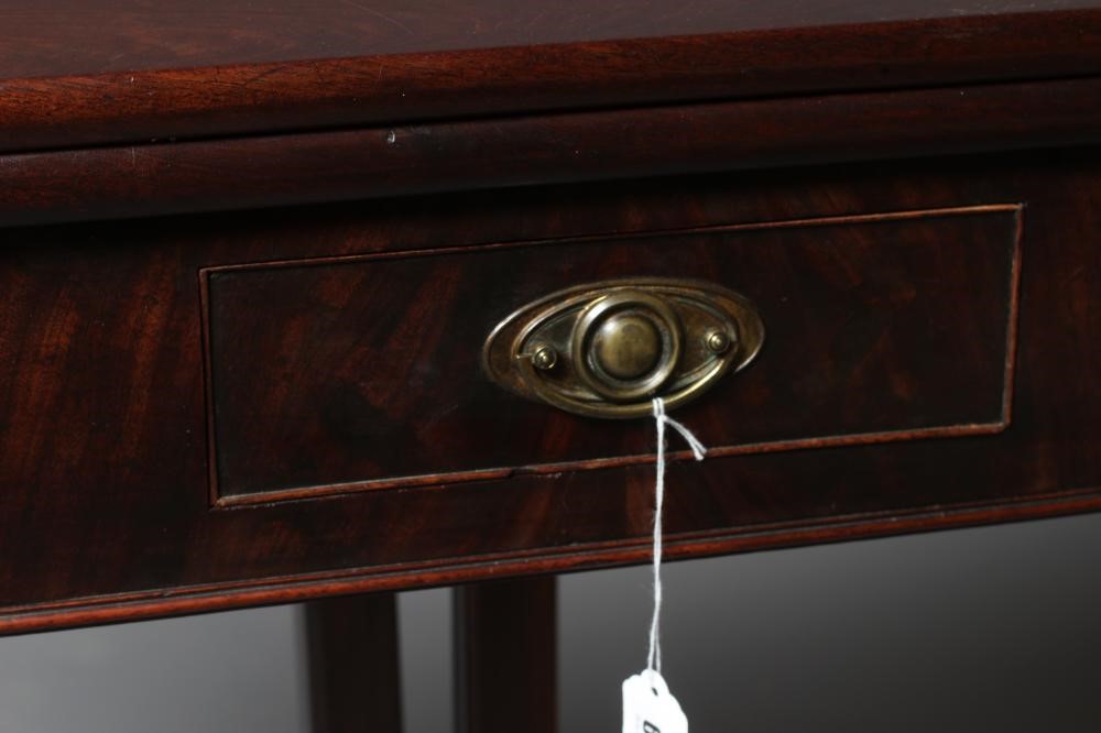 A GEORGIAN MAHOGANY FOLDING TEA TABLE Image