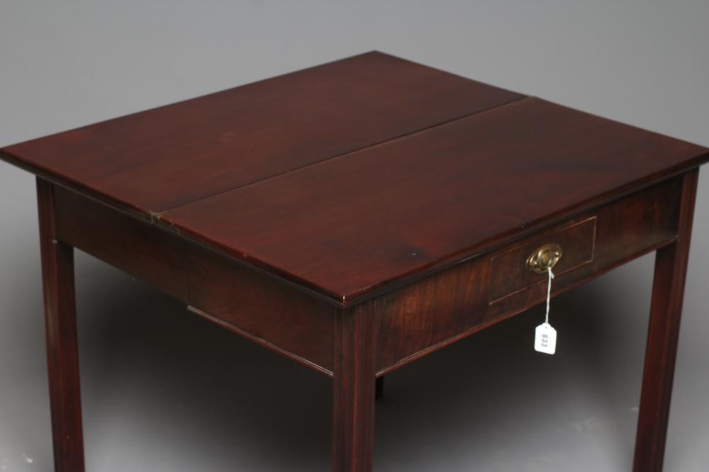 A GEORGIAN MAHOGANY FOLDING TEA TABLE Image