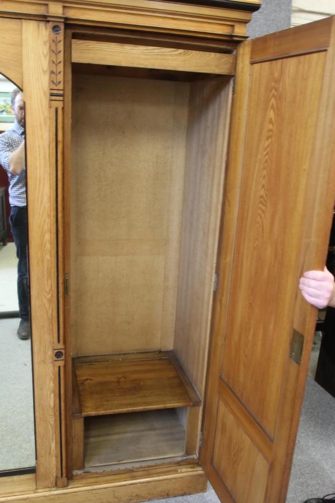 A VICTORIAN AESTHETIC TRIPLE WARDROBE in ash with ebonised trim Image