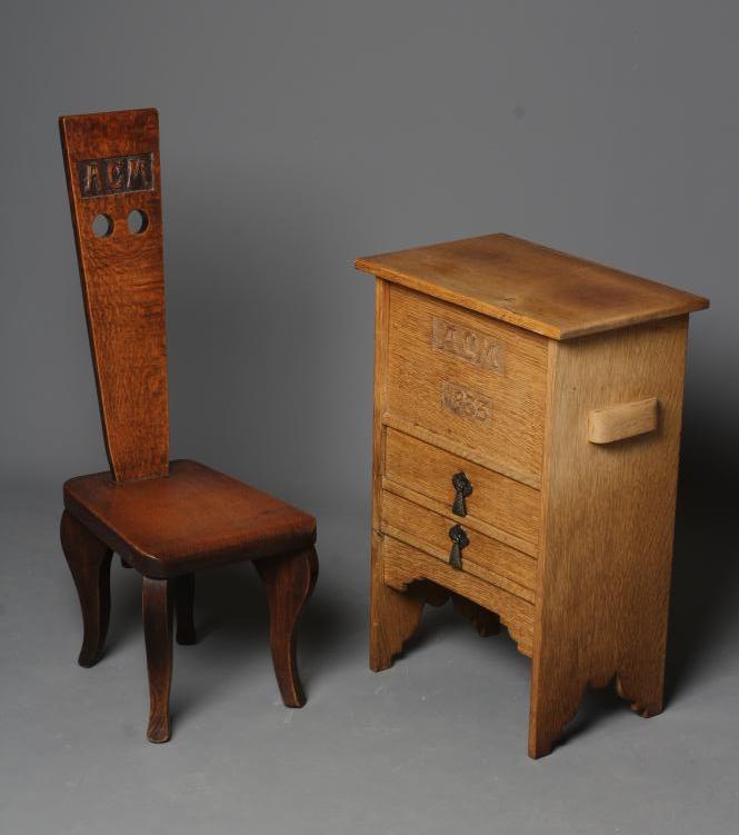 AN ARTS AND CRAFTS STYLE OAK SMALL CABINET by Brears of Addingham Image