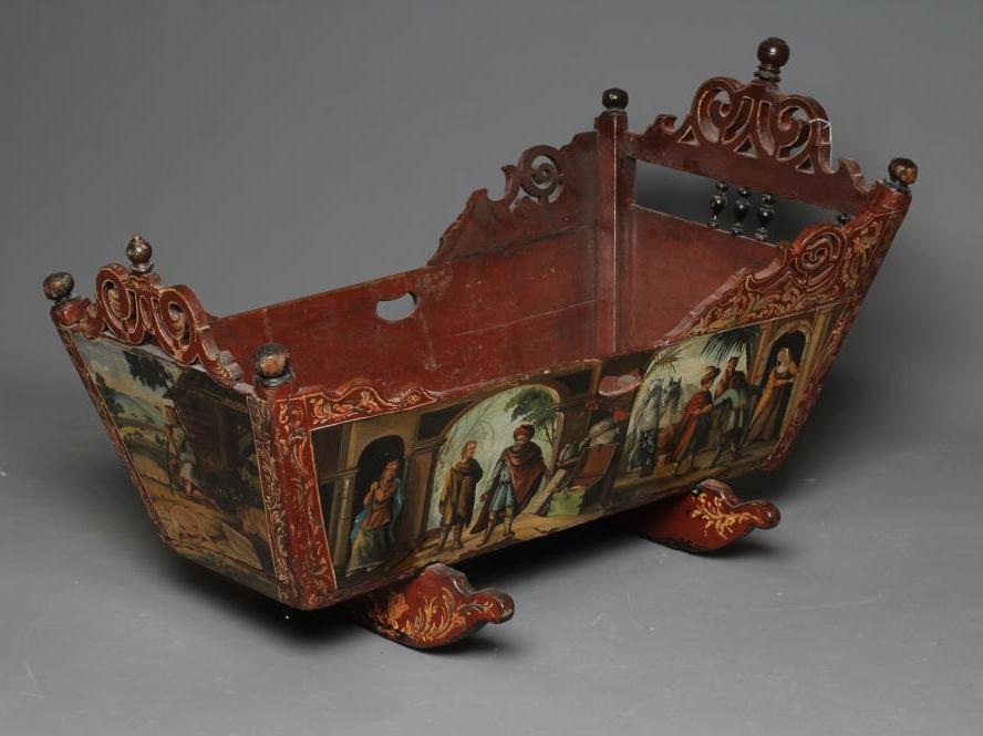A DUTCH HINDELOOPEN PAINTED PINE ROCKING CRADLE Image