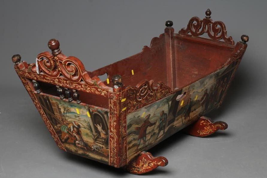 A DUTCH HINDELOOPEN PAINTED PINE ROCKING CRADLE Image