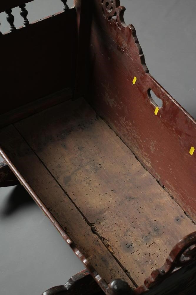 A DUTCH HINDELOOPEN PAINTED PINE ROCKING CRADLE Image