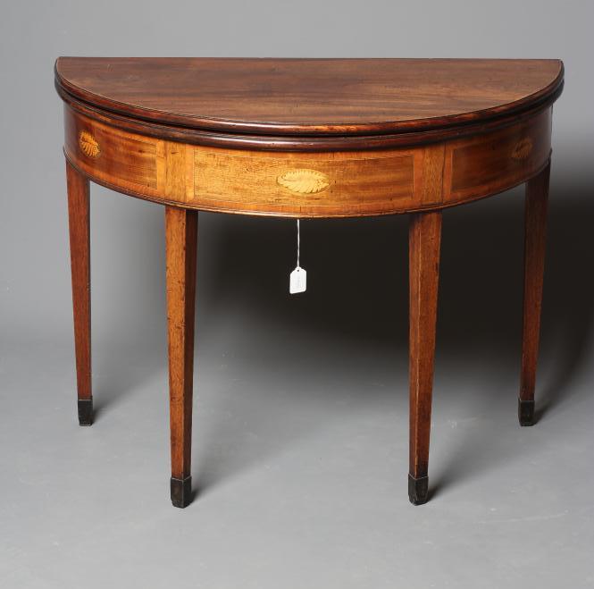 A GEORGIAN MAHOGANY FOLDING TEA TABLE Image