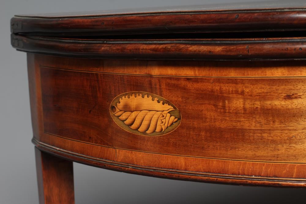 A GEORGIAN MAHOGANY FOLDING TEA TABLE Image
