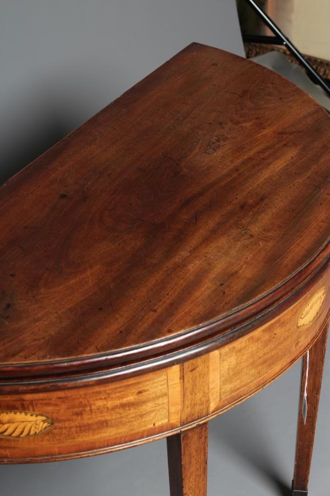 A GEORGIAN MAHOGANY FOLDING TEA TABLE Image