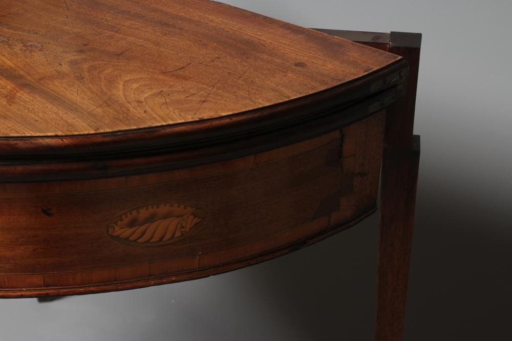 A GEORGIAN MAHOGANY FOLDING TEA TABLE Image