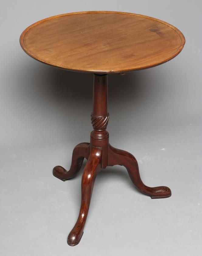 A MAHOGANY TRIPOD TABLE Image