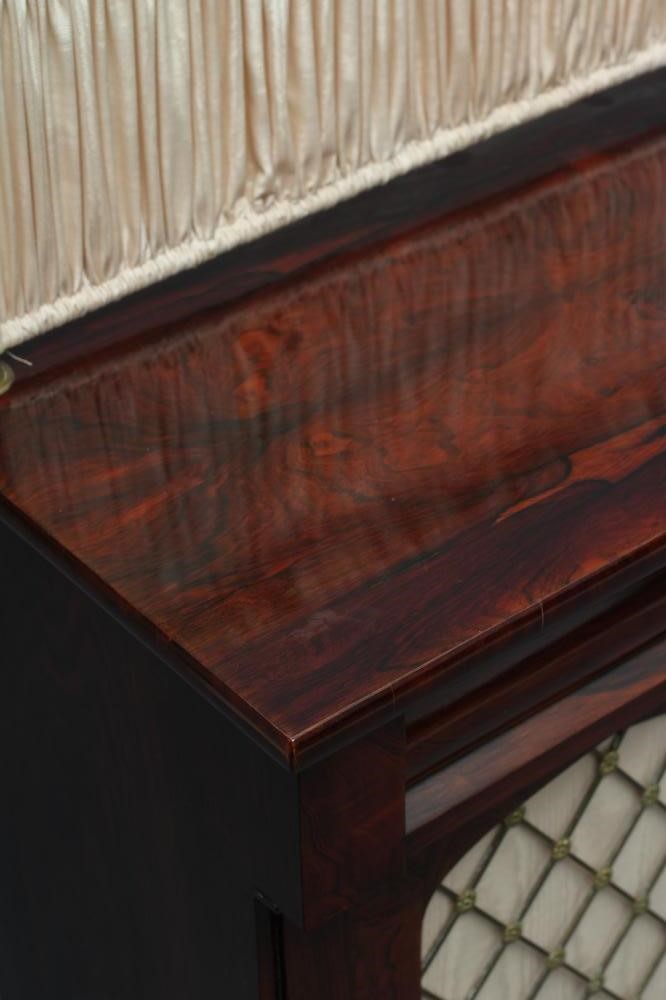 A VICTORIAN ROSEWOOD CHIFFONIER of shallow oblong form Image