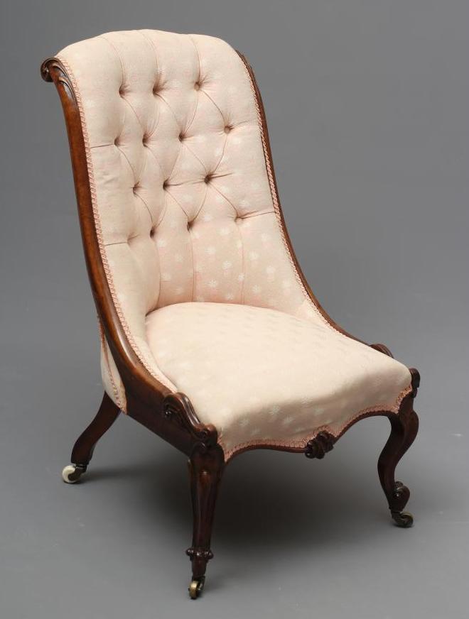 A VICTORIAN WALNUT SALON CHAIR of Grecian design Image