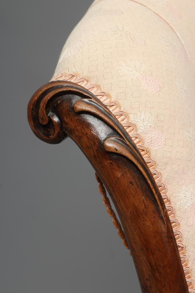 A VICTORIAN WALNUT SALON CHAIR of Grecian design Image