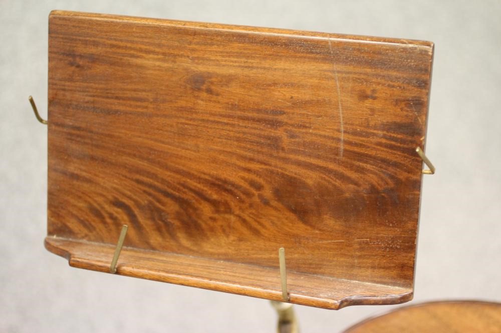 A VICTORIAN UNIVERSAL ADJUSTABLE TABLE/READING STAND patented by J. Carter Image