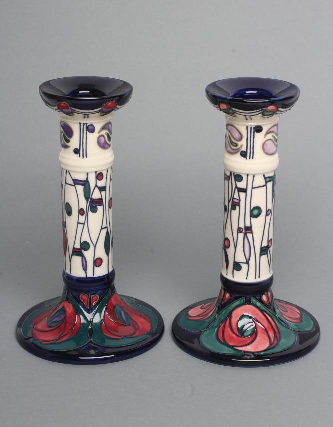 A PAIR OF MOORCROFT POTTERY MACKINTOSH PATTERN CANDLESTICKS Image