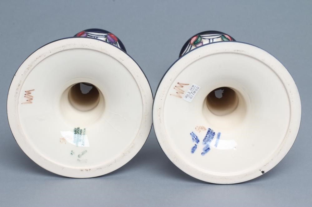 A PAIR OF MOORCROFT POTTERY MACKINTOSH PATTERN CANDLESTICKS Image