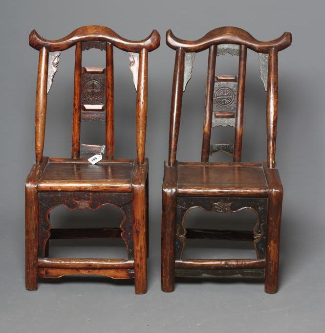 A PAIR OF CHINESE PROVINCIAL STAINED ELM(?) CHILD'S CHAIRS with black painted panels speckled with Image