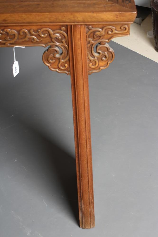 A CHINESE STAINED WOOD ALTAR TABLE Image
