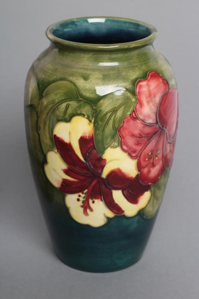 A MOORCROFT POTTERY HIBISCUS PATTERN VASE Image