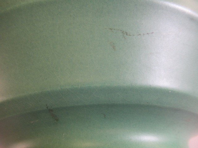 A KEITH MURRAY FOR WEDGWOOD EARTHENWARE VASE of ribbed spherical form in a "Matt Green" glaze Image