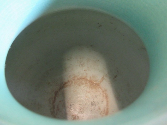 A KEITH MURRAY FOR WEDGWOOD EARTHENWARE VASE of ribbed spherical form in a "Matt Green" glaze Image