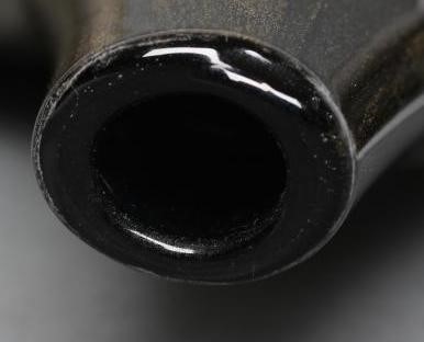 A MICHAEL HARRIS ISLE OF WIGHT BLACK AZURENE GLASS LOLLIPOP VASE with aventurine inclusions Image