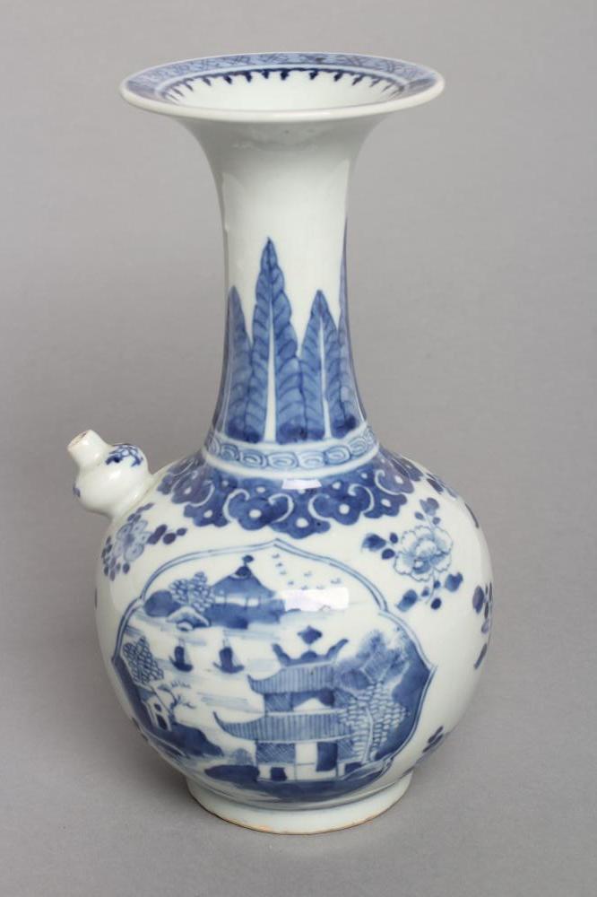 A CHINESE PORCELAIN KENDI painted in underglaze blue with two quatrefoil panels enclosing river Image