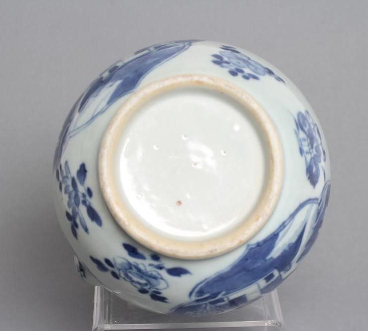 A CHINESE PORCELAIN KENDI painted in underglaze blue with two quatrefoil panels enclosing river Image