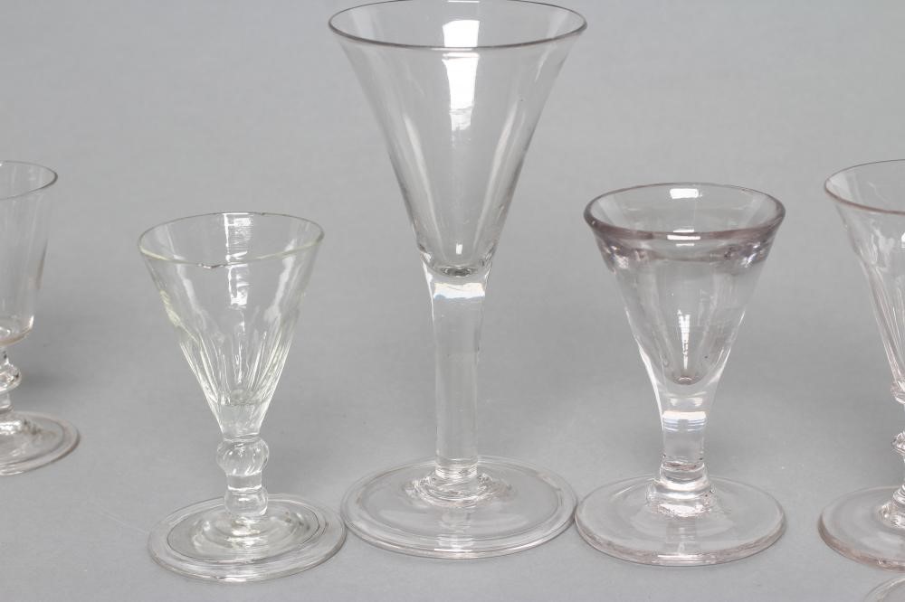 A COLLECTION OF EIGHT GEORGIAN AND LATER WINE AND CORDIAL GLASSES including two toastmasters' Image