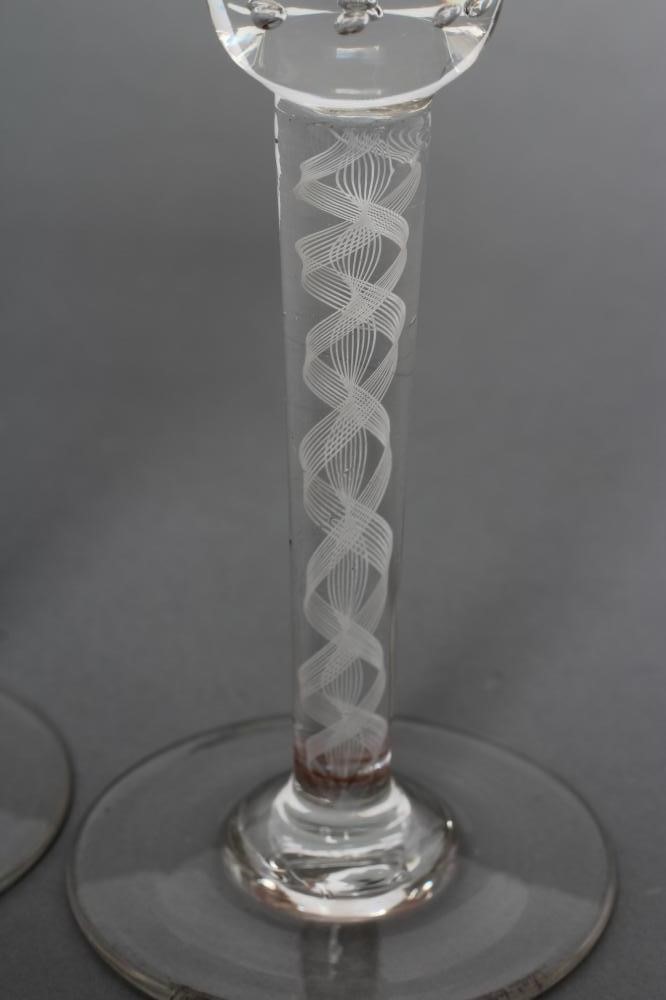 A PAIR OF WINE GLASSES Image