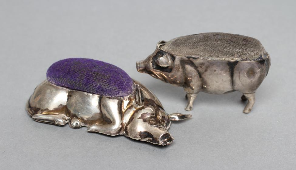 TWO SILVER PIG PIN CUSHIONS Image