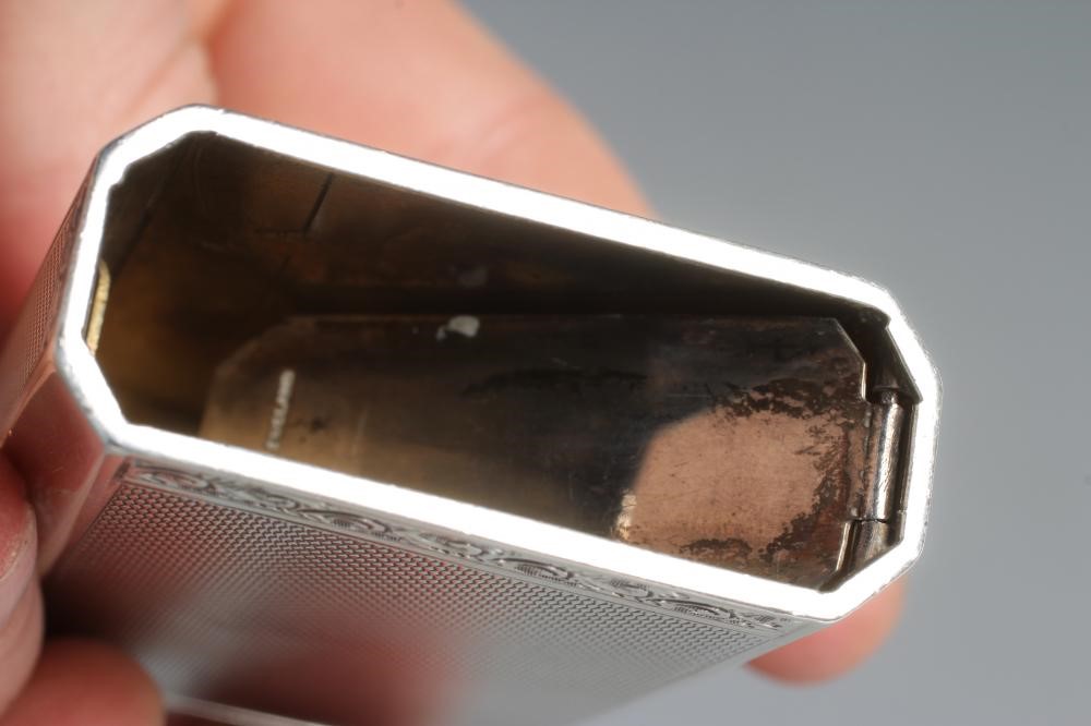 AN UNUSUAL SILVER CIGARETTE CASE Image