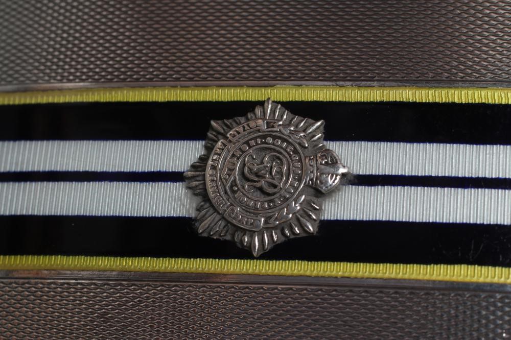 A SILVER COMPACT Image