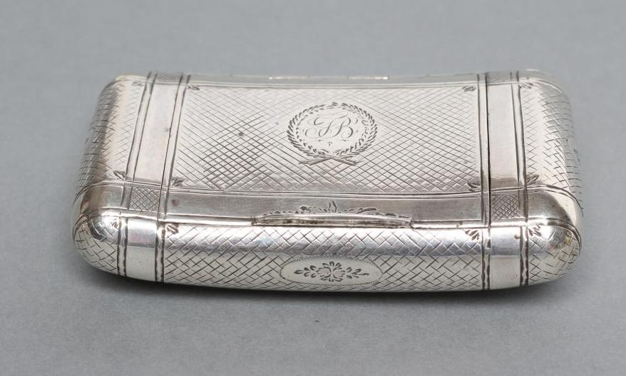 A LATE GEORGE III SILVER SNUFF BOX Image