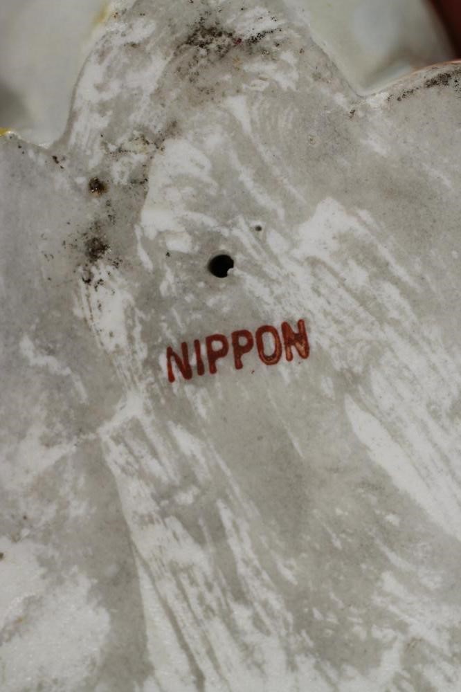 A PAIR OF JAPANESE PORCELAIN CATS Image