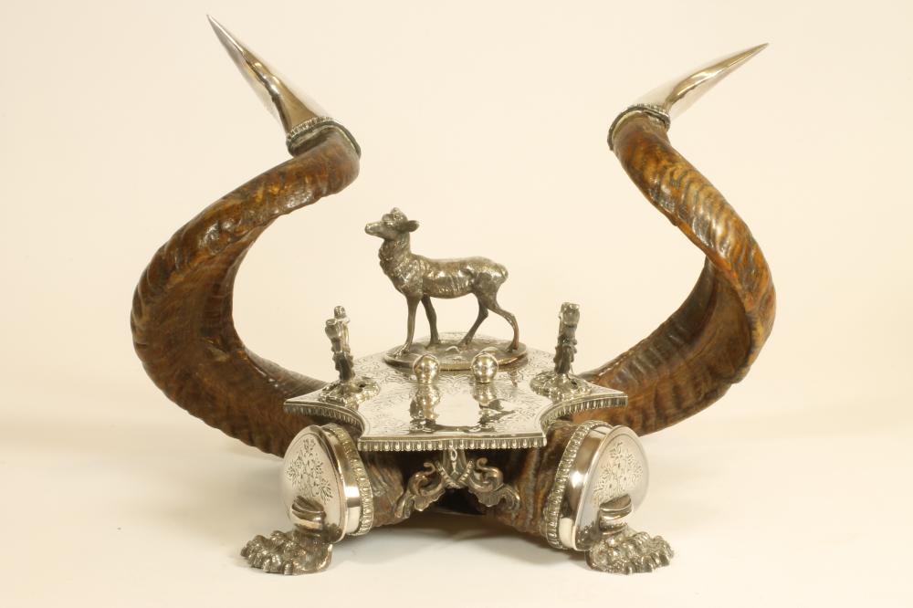 A VICTORIAN RAM'S HORN DESK STAND Image